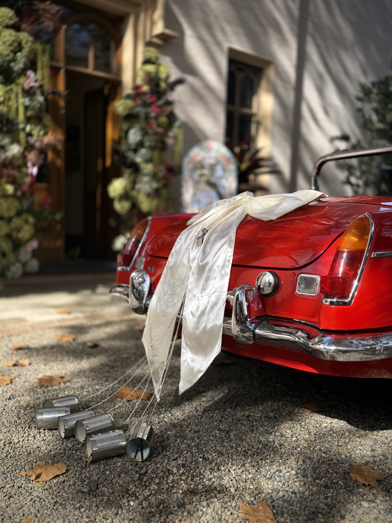Bride with vintage MG B roadster wedding car hire Sydney